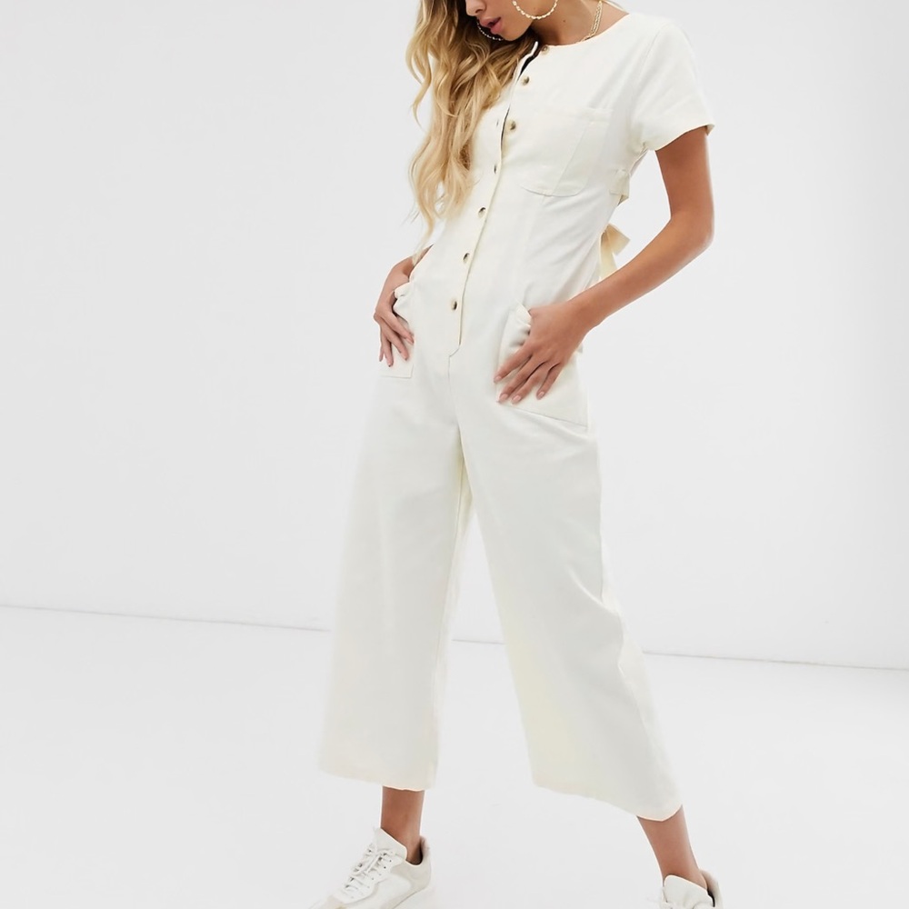 ASOS DESIGN denim button through jumpsuit with open back